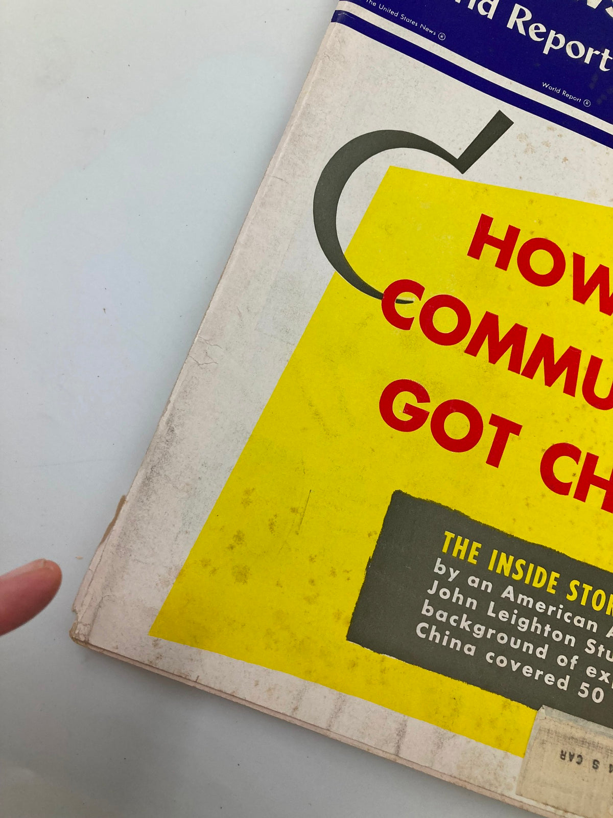 Close-up view of the cover of US News & World Report Magazine, October 1, 1954, highlighting the title 'How The Communists Got China'.