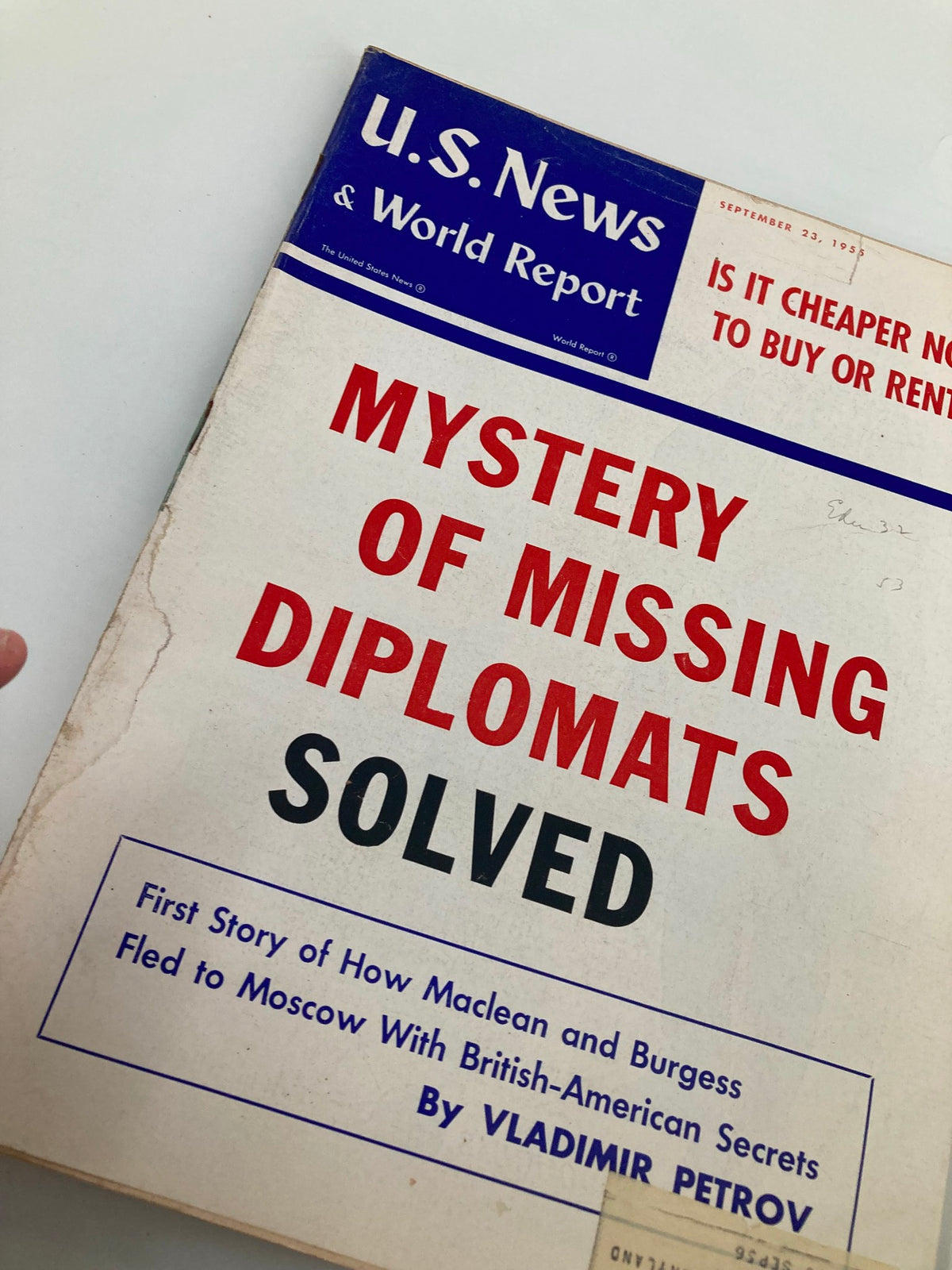 Close-up of the cover of US News & World Report Magazine September 23, 1955. The cover prominently displays 'Mystery of Missing Diplomats Solved' along with details of the article by Vladimir Petrov.