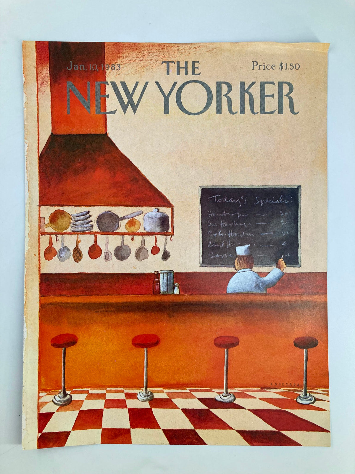 COVER ONLY The New Yorker January 10, 1983, featuring the illustration 'Today's Specials' by Abel Quezada. The image showcases a vintage diner scene with a chef in a white hat writing specials on a chalkboard, surrounded by red bar stools and kitchen utensils hanging on the wall.