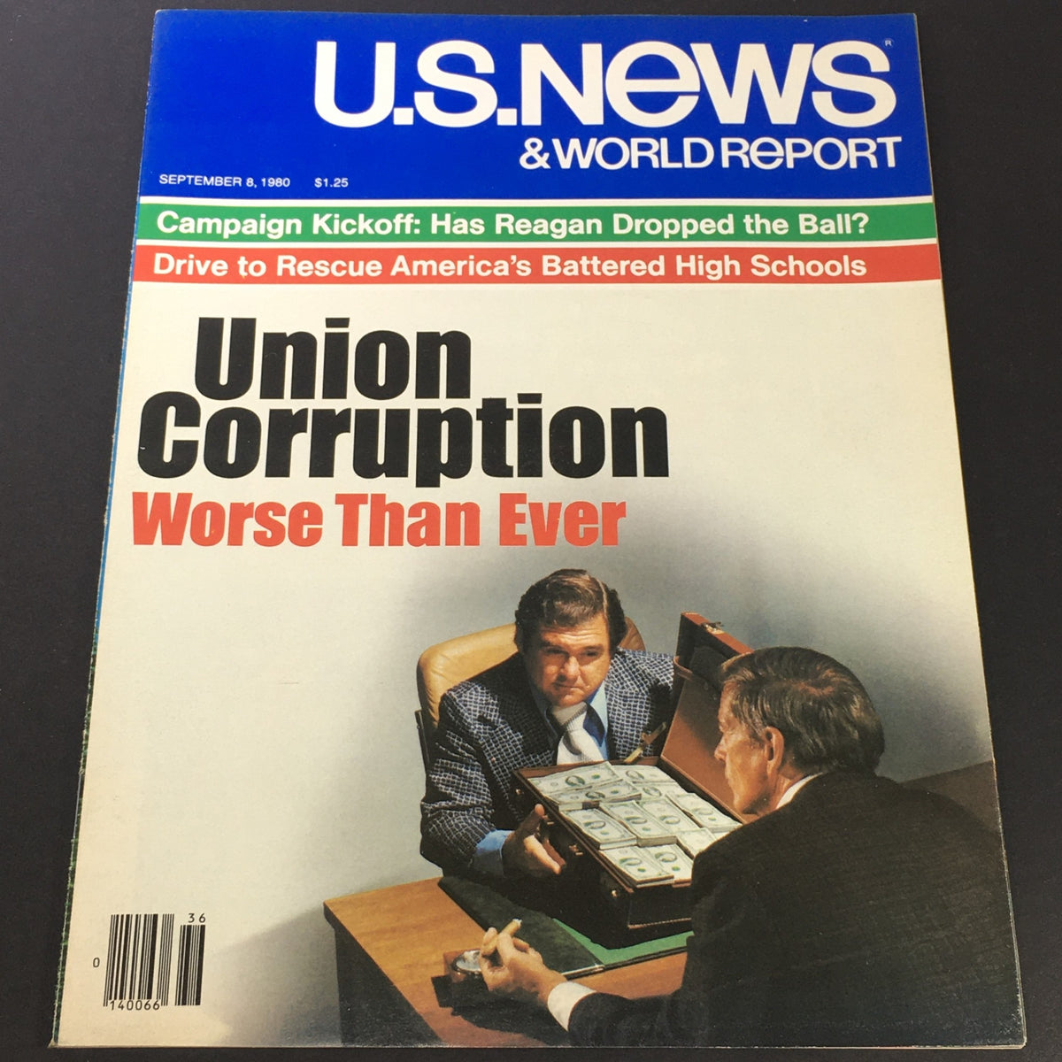 Cover of the U.S. News & World Report from September 8, 1980, featuring the headline 'Union Corruption Worse Than Ever', showcasing an image of two men at a table—one displaying a briefcase filled with cash, highlighting themes of corruption in unions.