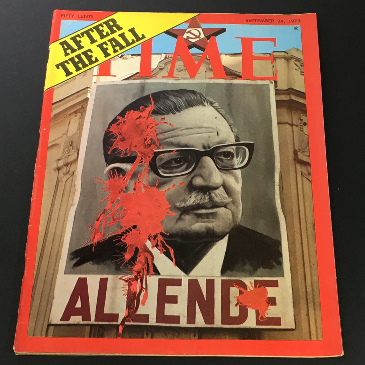 VTG Time Magazine September 24 1973 cover featuring Salvador Allende with bold title 'After The Fall' and artistic splashes of red, highlighting the impact of his presidency.