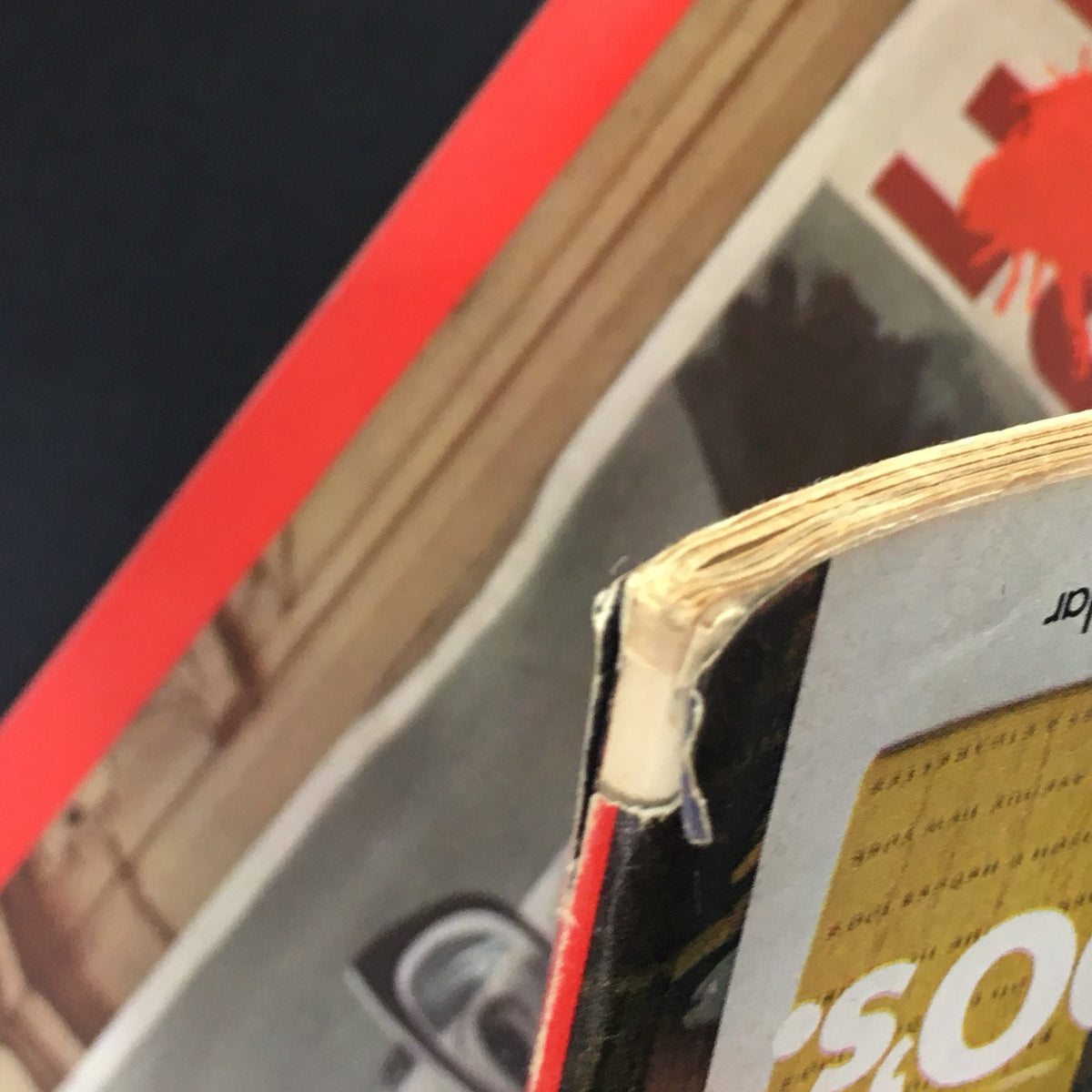 Close-up view of the spine of the VTG Time Magazine September 24 1973, showcasing its vintage condition and elements of wear.