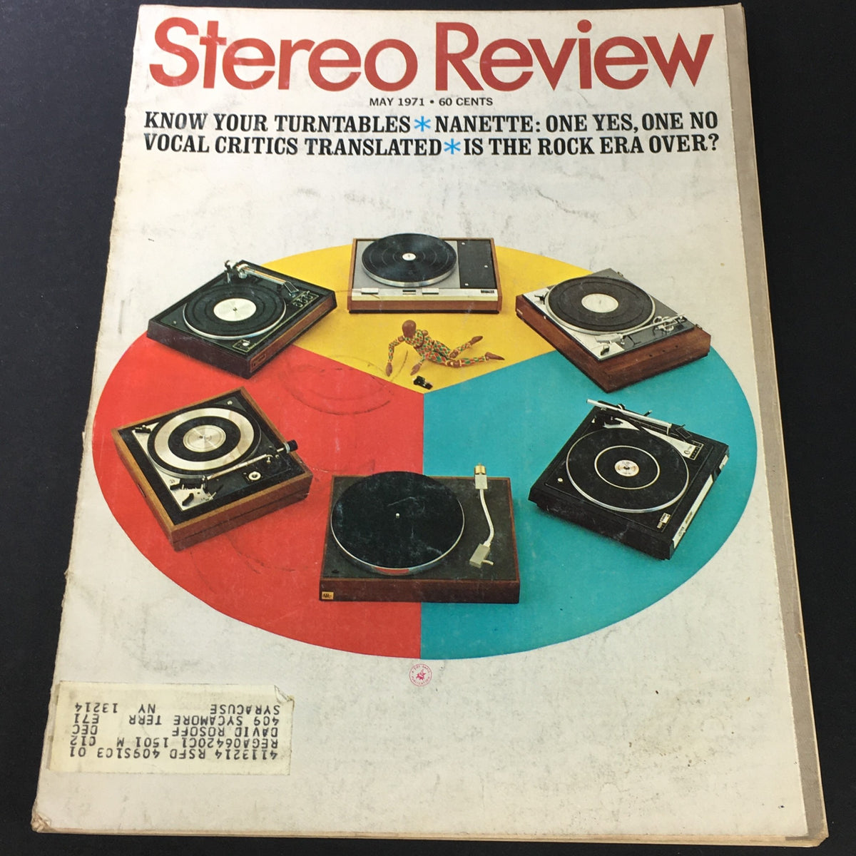 Vintage Stereo Review Music Magazine from May 1971 featuring the headline 'Nanette, One Yes, One No', showcasing a vibrant design with multiple turntables arranged in a colorful circular layout, a reflection of the musical trends of the early '70s.
