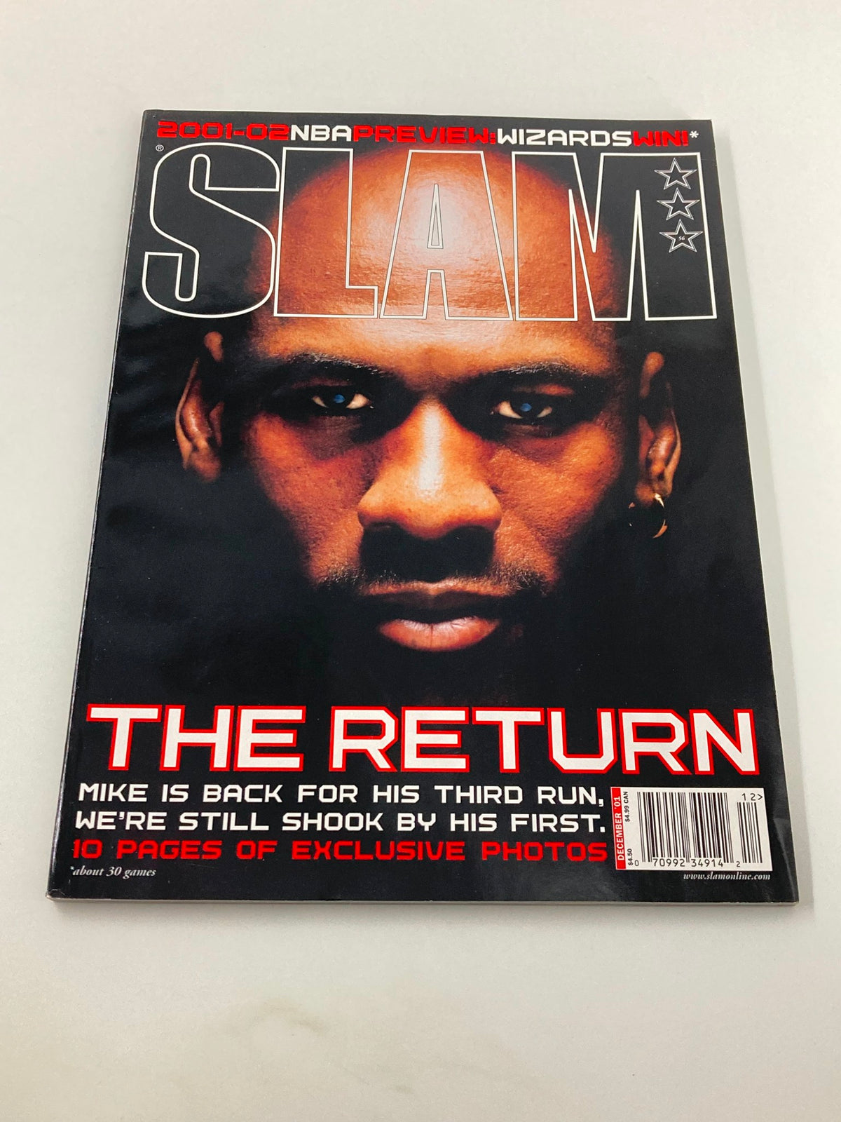 Slam Magazine December 2001 #56 showcasing Michael Jordan's iconic cover image with the title 'THE RETURN'. Celebrates his return to basketball.