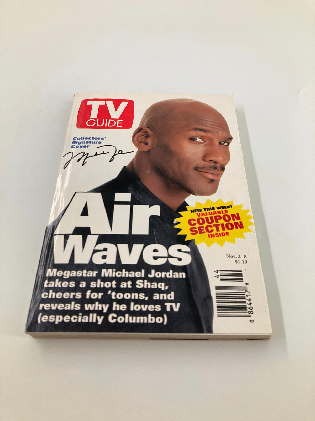 Close-up view of the TV Guide Magazine from November 2, 1996, highlighting Michael Jordan on the cover, marked as 'Collectors' Signature Cover.' The magazine captures the essence of 90s pop culture.