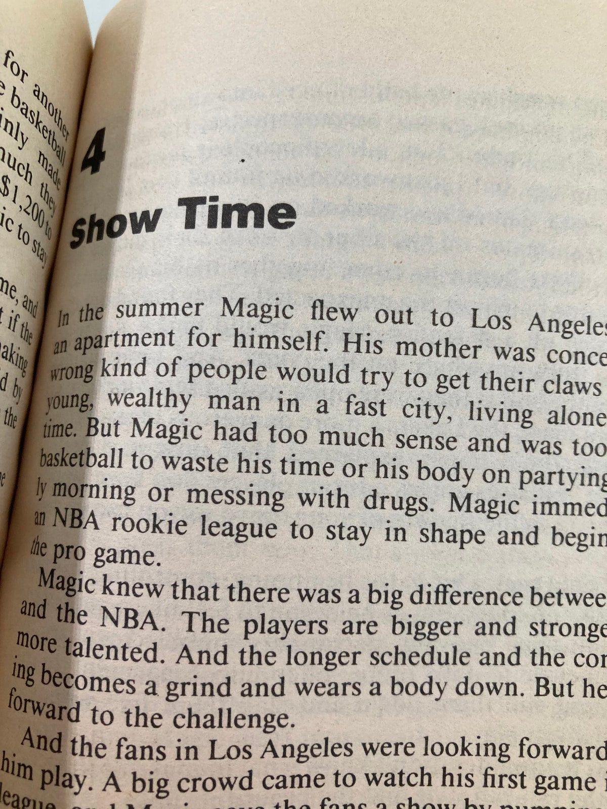 Excerpt from the book '1991 Superstars Michael Jordan and Magic Johnson by Richard J. Brenner' titled 'Show Time', detailing Magic Johnson's rise and challenges in basketball.