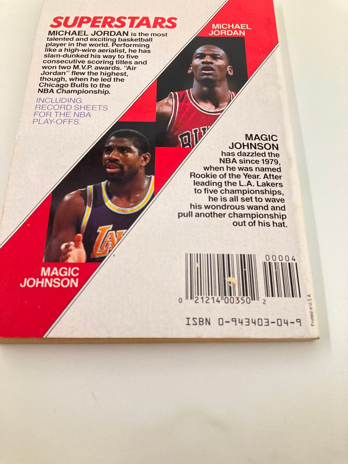 Back cover of the book '1991 Superstars Michael Jordan and Magic Johnson by Richard J. Brenner', highlighting the accomplishments of Michael Jordan and Magic Johnson in professional basketball.
