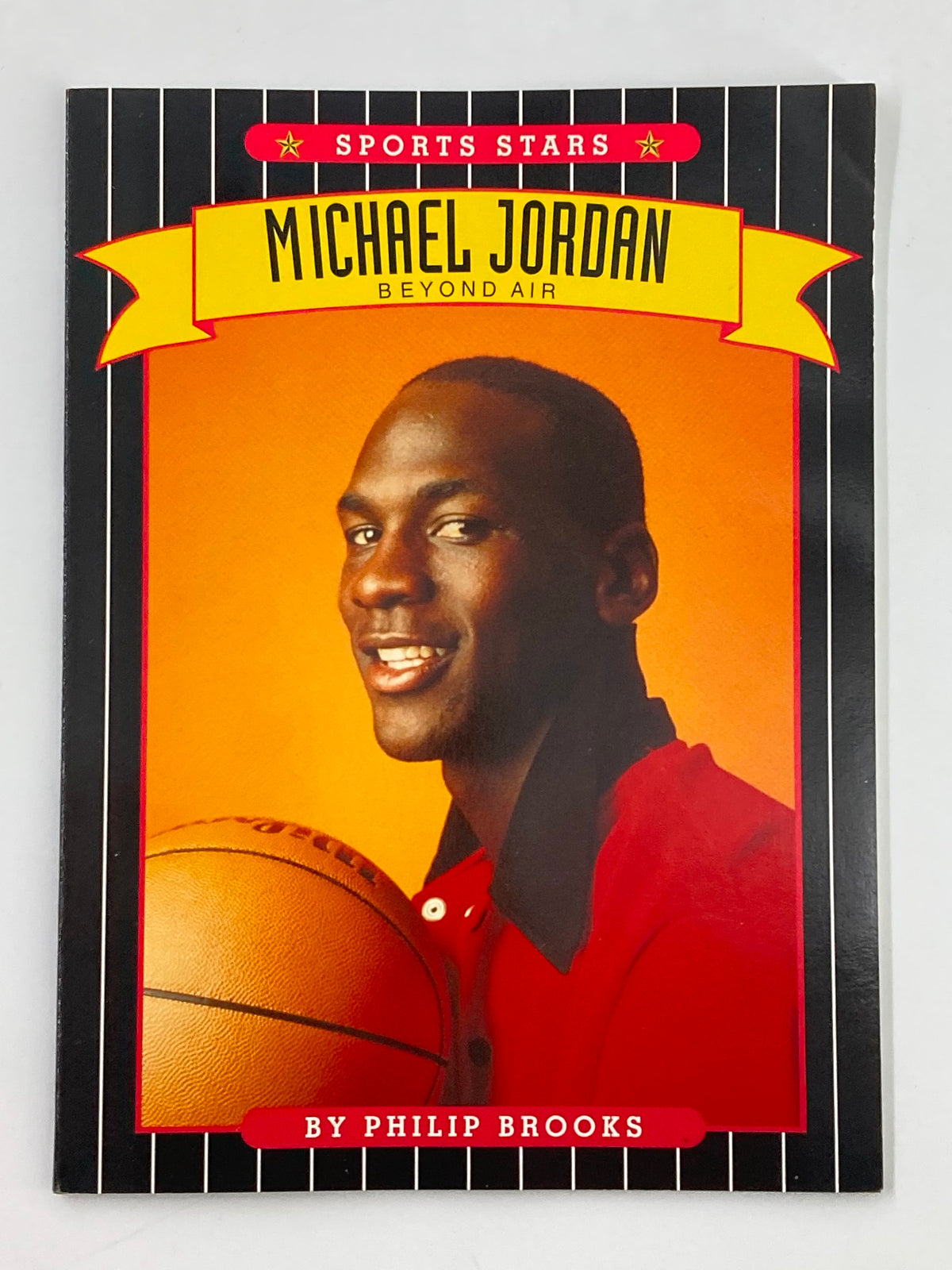 1995 Sports Stars Michael Jordan Beyond Air Book by Philip Brooks, featuring a vibrant cover design with Michael Jordan smiling while holding a basketball.