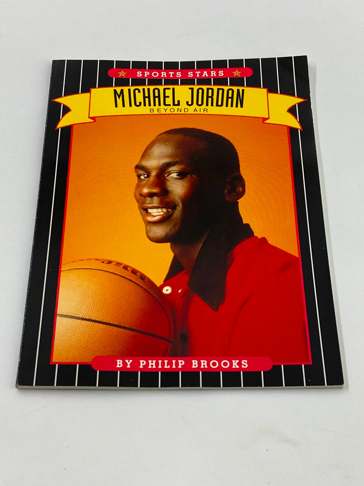 1995 Sports Stars Michael Jordan Beyond Air Book by Philip Brooks, showcasing an eye-catching cover with a portrait of Michael Jordan and a bold title design.