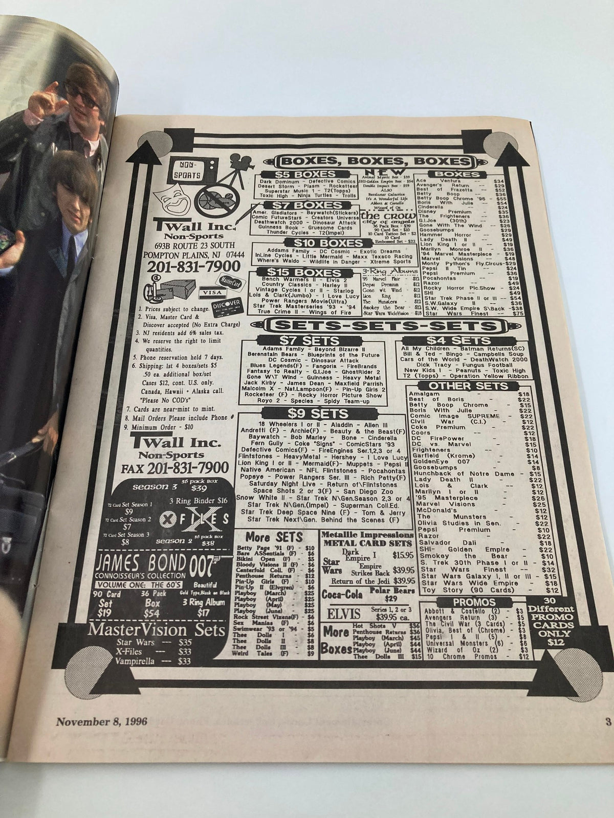 Entertainment Cards Price Guide November 8 1996 showcasing a full page advertisement for non-sports entertainment card boxes. A variety of card box prices are listed, capturing the essence of the 90s collectible market.