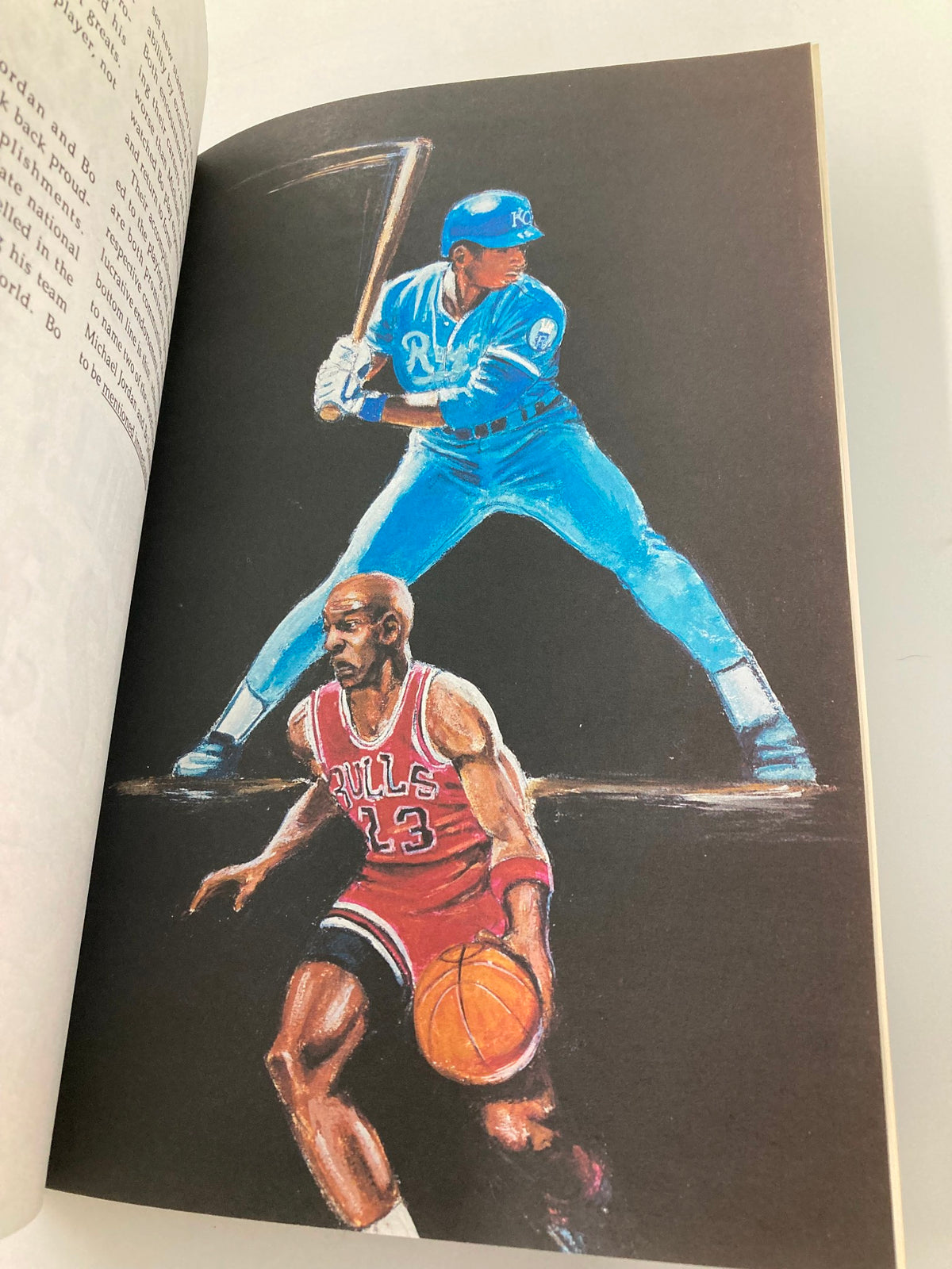 Artwork depicting Michael Jordan dribbling a basketball while Bo Jackson stands ready to bat in a Kansas City Royals uniform, featured in the January 1992 Bo Jackson versus Michael Jordan #1 Illustration Biography VG.