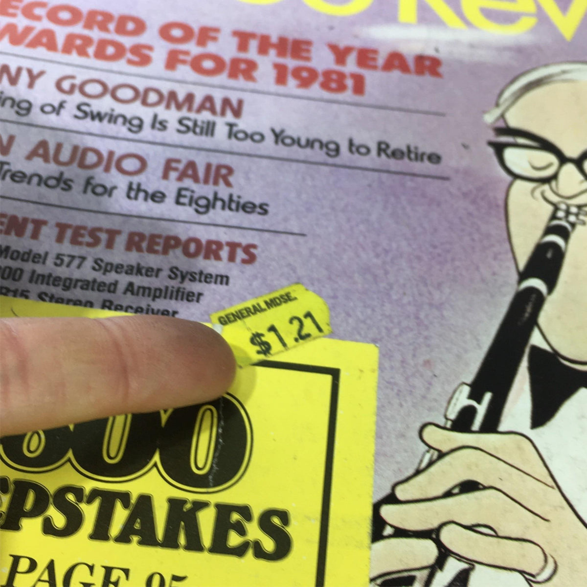 Detail view of the price sticker on the VTG Stereo Review Music Magazine February 1982 showcasing the original price of $1.21.