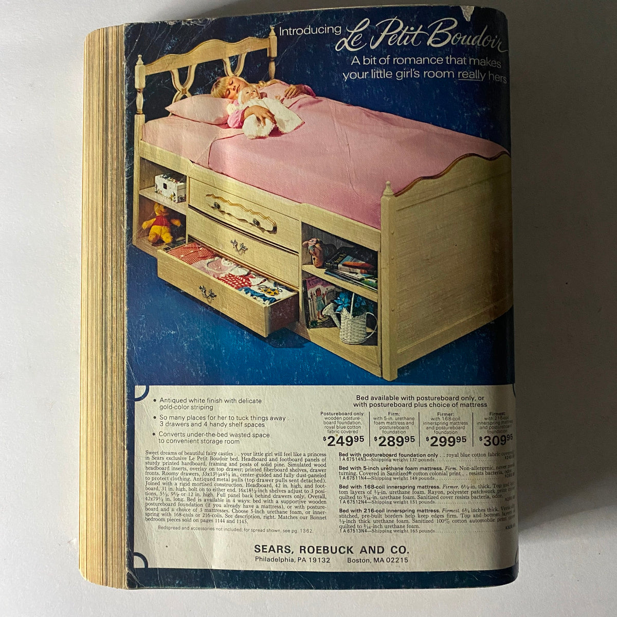 Page from the 1975 Sears Spring Summer Toughskins Bib Overall, Jacket Jeans Catalog introducing the Le Petit Boudoir kids' bed with storage options and pricing.