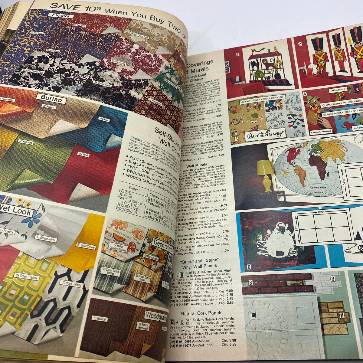 1973 JCPenney Fall and Winter All in Layers Catalog displaying a variety of fabric and wallpaper designs, including burlap and geometric patterns for home decor.