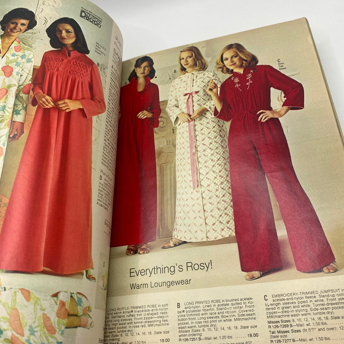 1977 JCPenney Fall and Winter Catalog presenting loungewear with vibrant colors and styles, featuring long dresses and cozy ensembles for women.