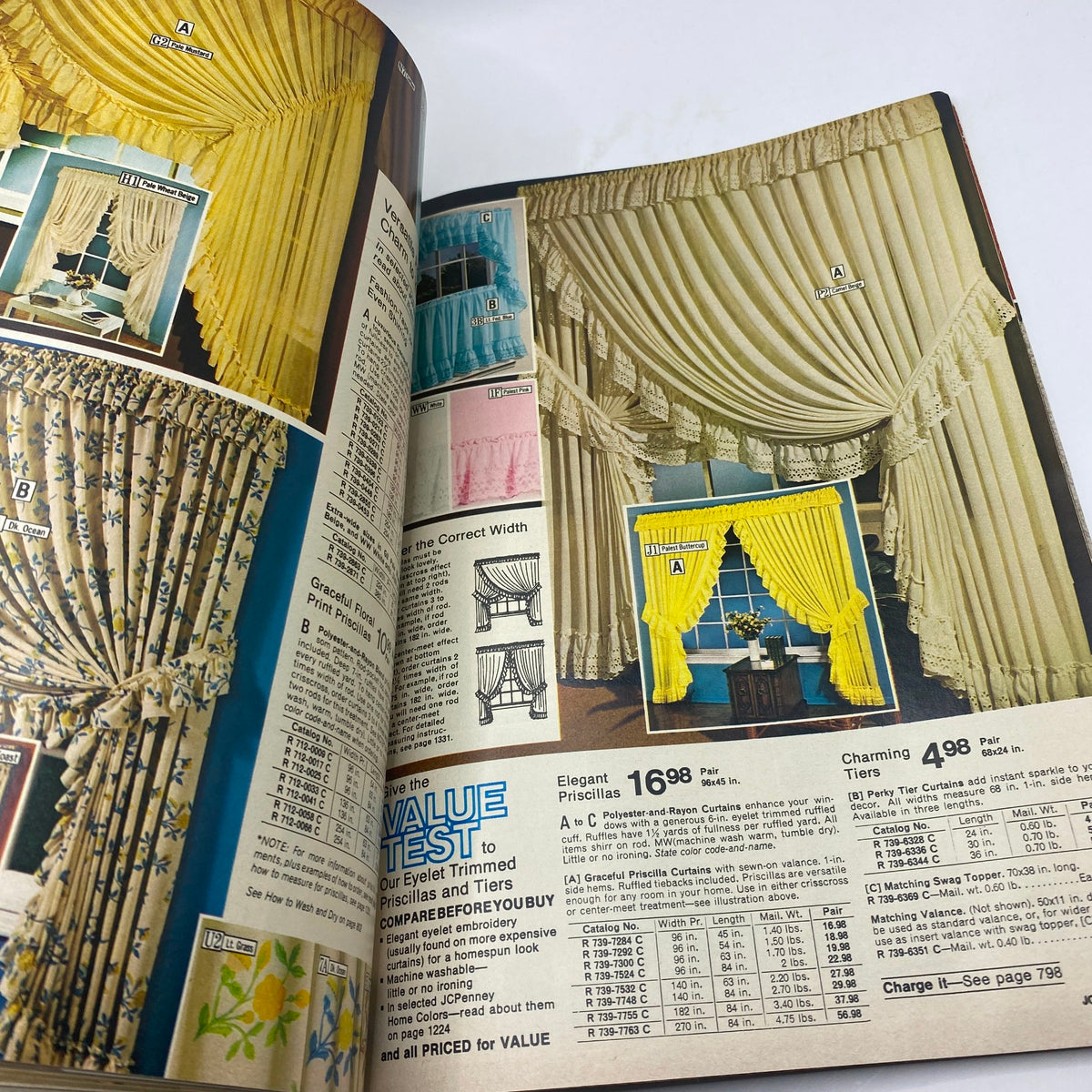1977 JCPenney Fall and Winter Catalog showcasing elegant curtains and draperies with pricing details including options for eyelet trimmed valances.