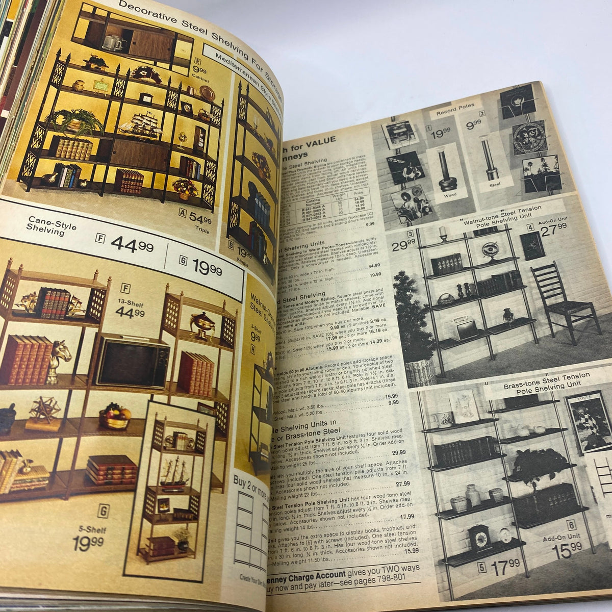 1977 JCPenney Fall and Winter Catalog displaying decorative shelving units including cane-style and brass-tone designs, complete with pricing information.
