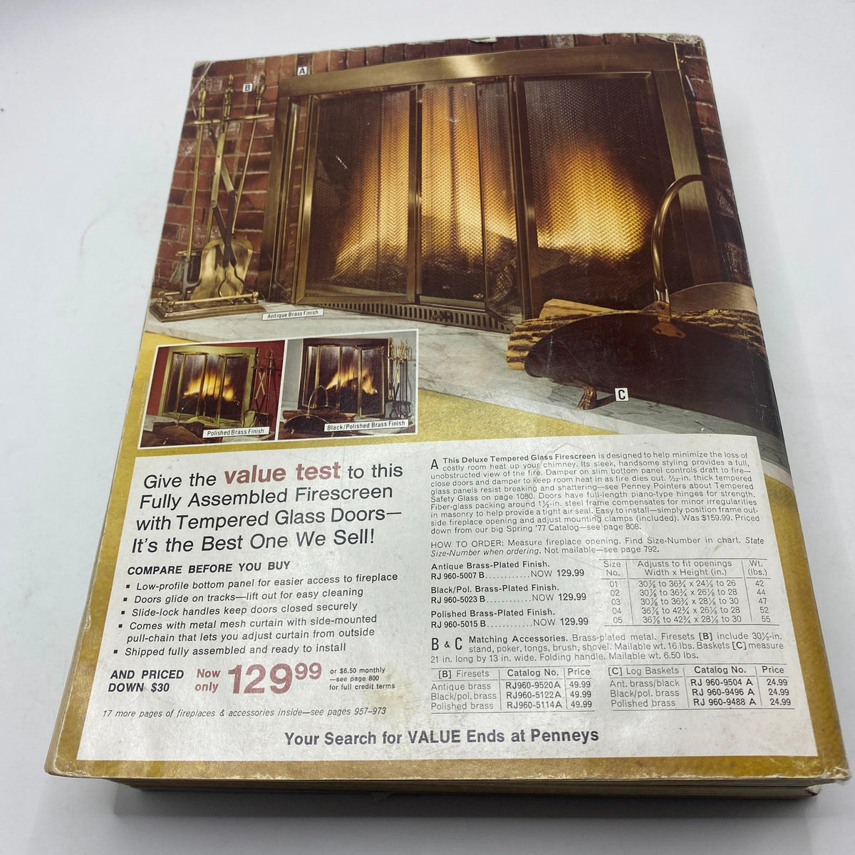 1977 JCPenney Fall and Winter Catalog back cover featuring a fully assembled firescreen with tempered glass doors, highlighting its value and pricing details.