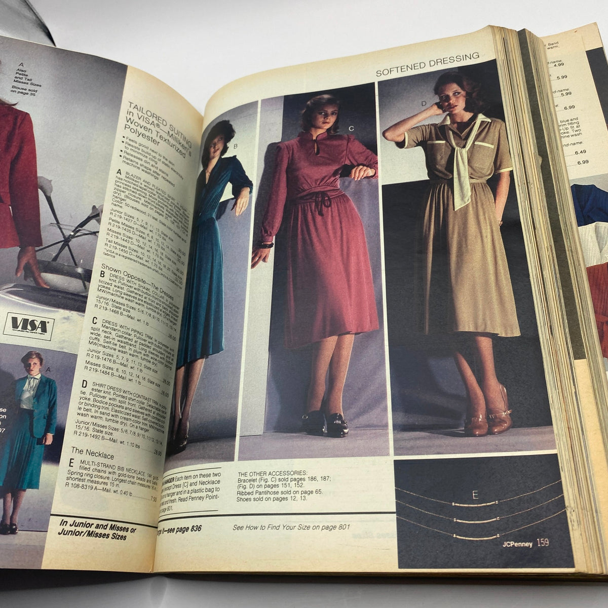 Inside page of the 1979 JCPenney Fall and Winter Softened Dressing Catalog displaying dresses and accessories in various colors.