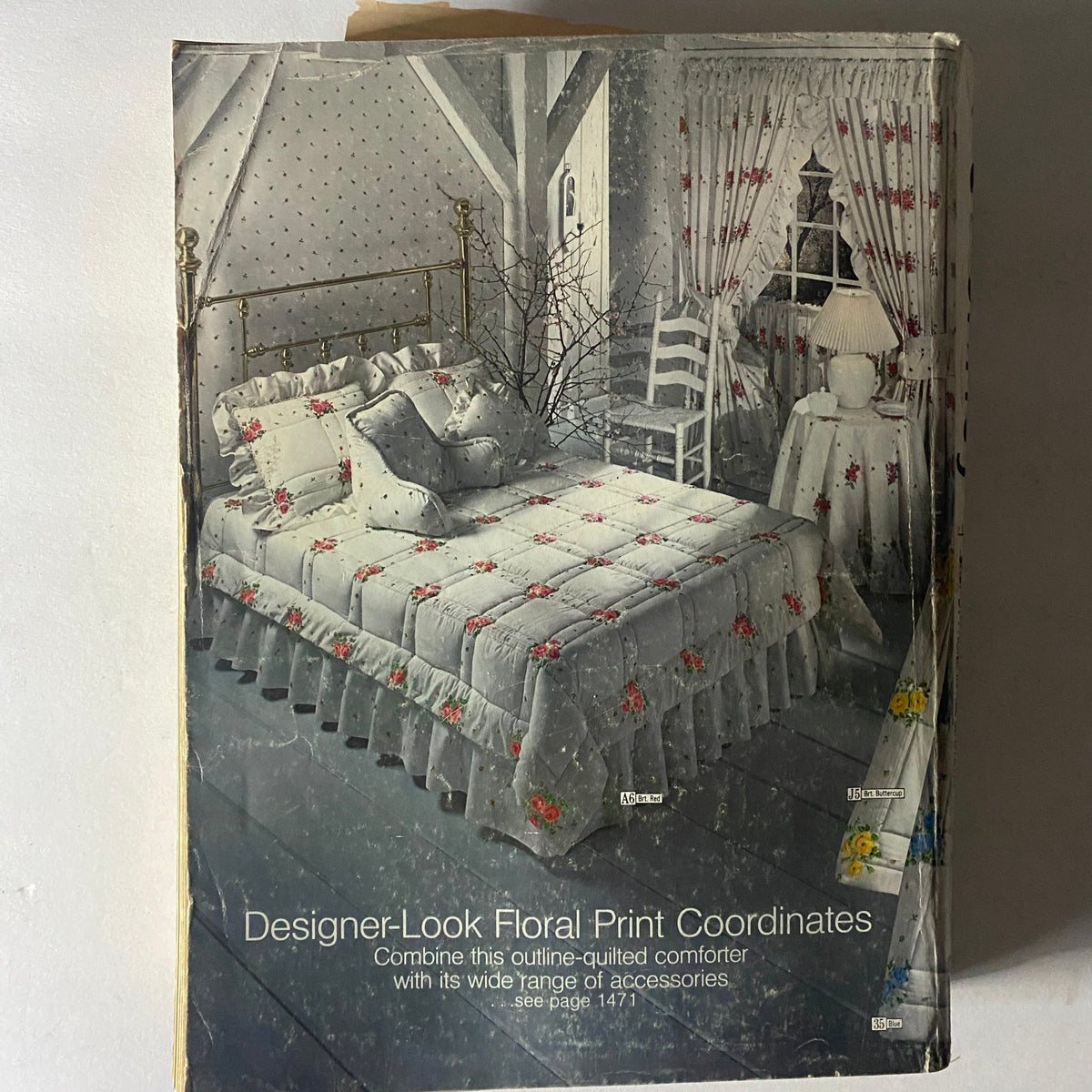 Cover image of the 1979 JCPenney Fall and Winter Softened Dressing Catalog showcasing a beautifully arranged bedroom featuring Designer-Look Floral Print Coordinates. The image highlights a floral print comforter, coordinated decor, and a cozy atmosphere.