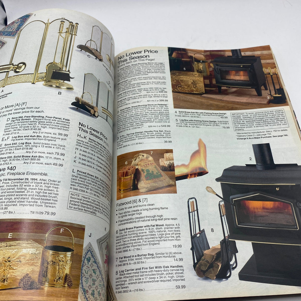 1994 JCPenney Fall and Winter Intarsia Sweater Catalog, presenting fireplace accessories and stoves for a warm winter atmosphere.