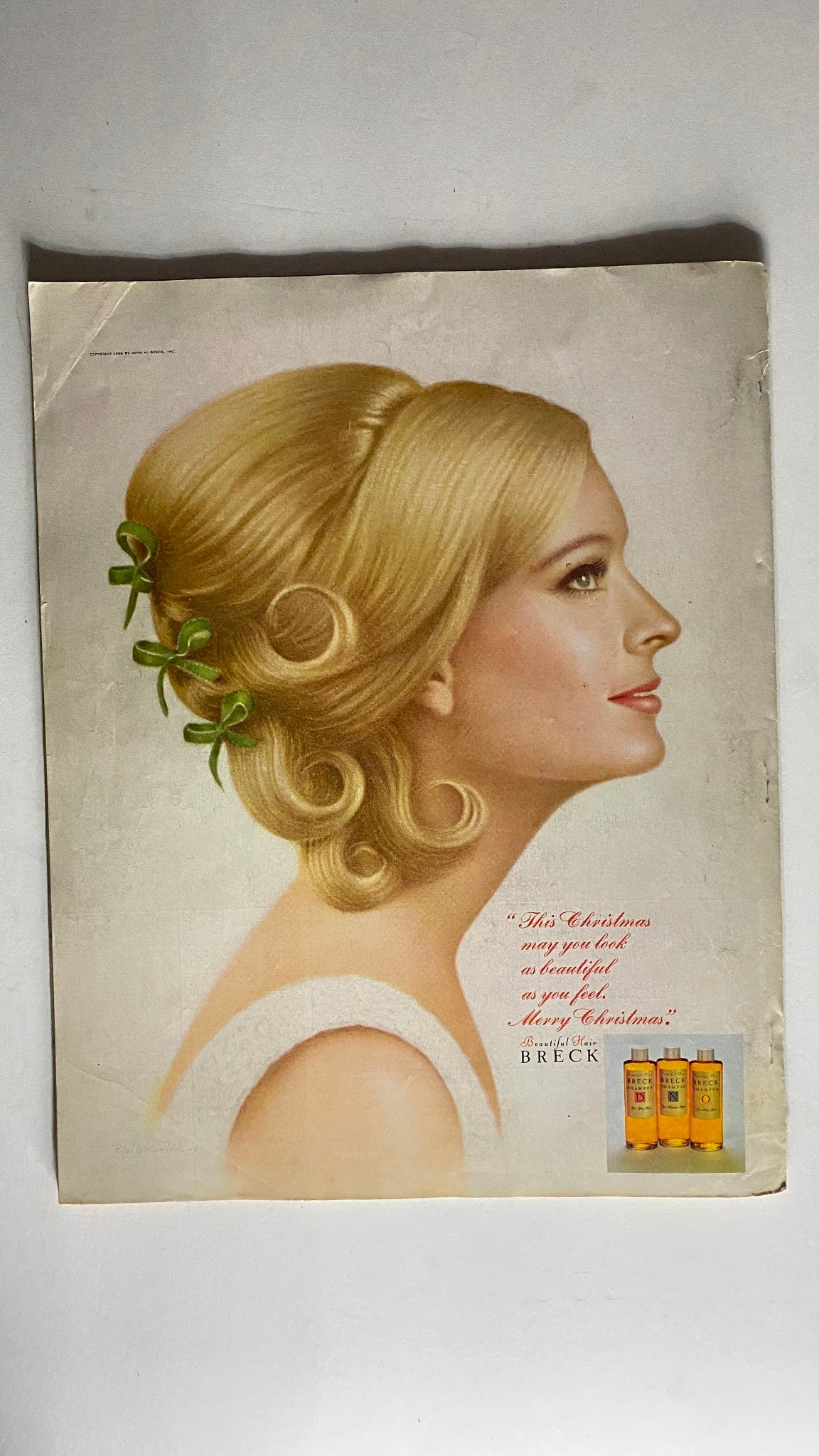 Advertisement page from VTG American Home Magazine December 1966 Christmas Issue featuring a blonde model and a Breck shampoo advertisement.