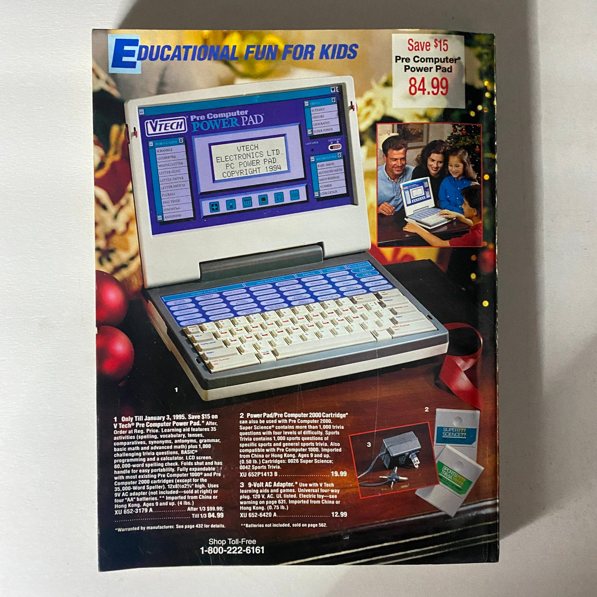 Back cover of the 1994 JCPenney Christmas Gifts Under $30 Catalog showcasing the VTech Pre Computer Power Pad. The image features the product details, price, and promotional offers, set against a festive background with family enjoying educational fun.