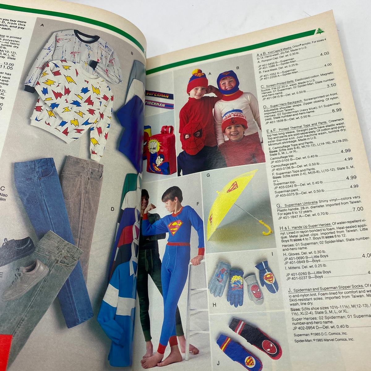 Inside page of the 1986 JCPenney Christmas NFL for The Kids Catalog displaying various children’s clothing items and accessories, including superhero and winter apparel.