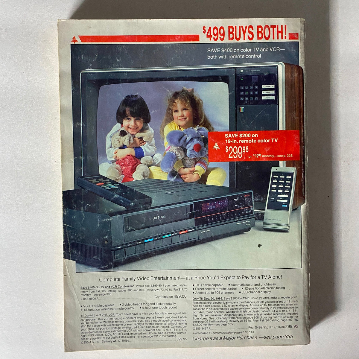 1986 JCPenney Christmas NFL for The Kids Catalog advertisement for a family video entertainment system, showcasing a color TV and VCR package at a promotional price.