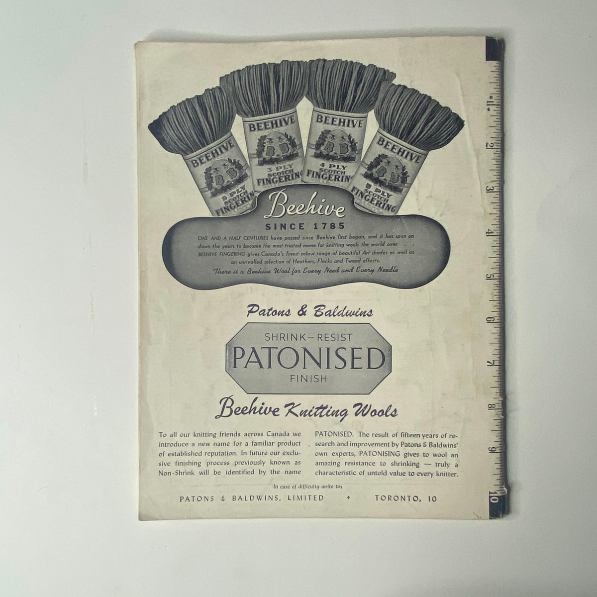 Cover page of the 1940s Series No. 31 Beehive Styles for Girls and Boys Catalog, displaying Beehive Knitting Wools with a vintage design by Patons & Baldwins.