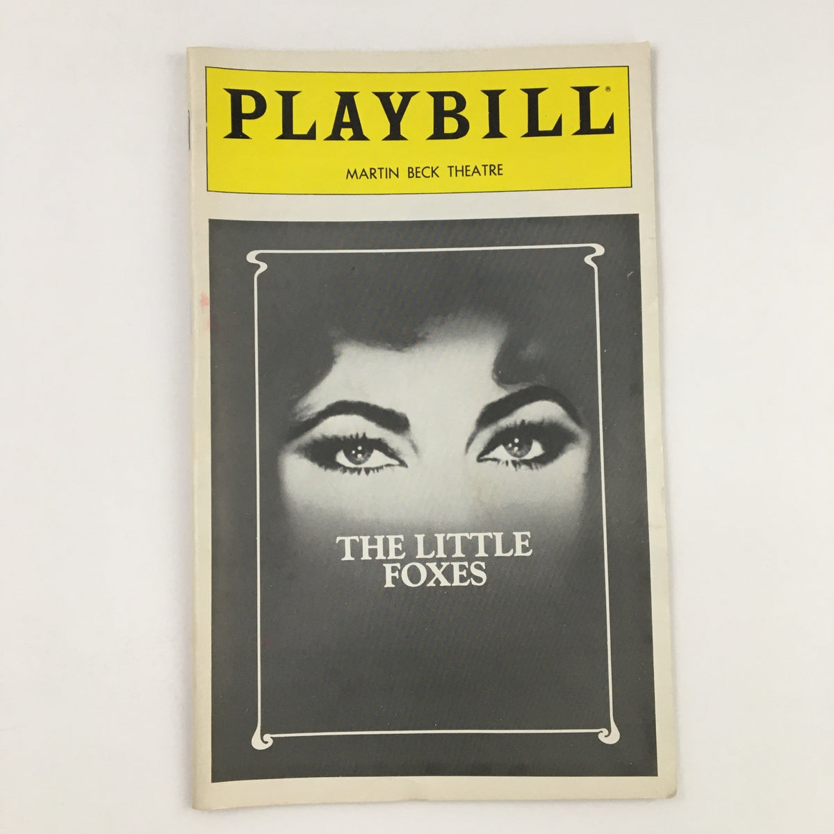 1981 Playbill for The Little Foxes featuring Elizabeth Taylor, presented at Martin Beck Theatre, showcasing a dramatic cover with striking eyes.