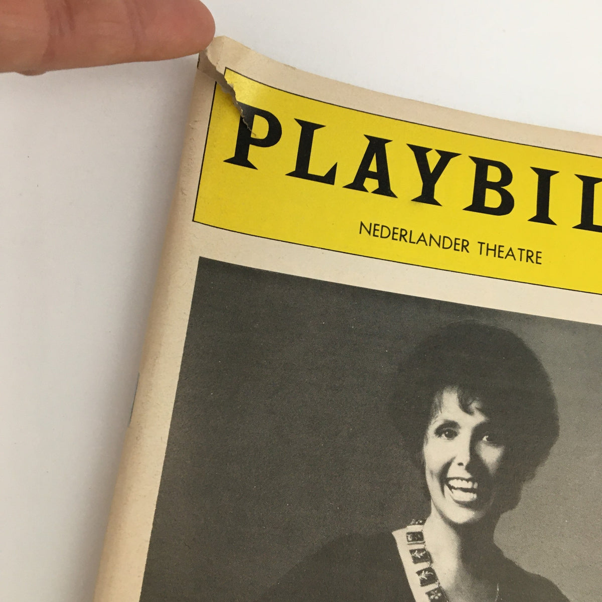 Close-up of the top of the original 1981 Playbill from the Nederlander Theatre featuring Lena Horne in The Lady and Her Music, showing the torn edge and prominent Playbill title.