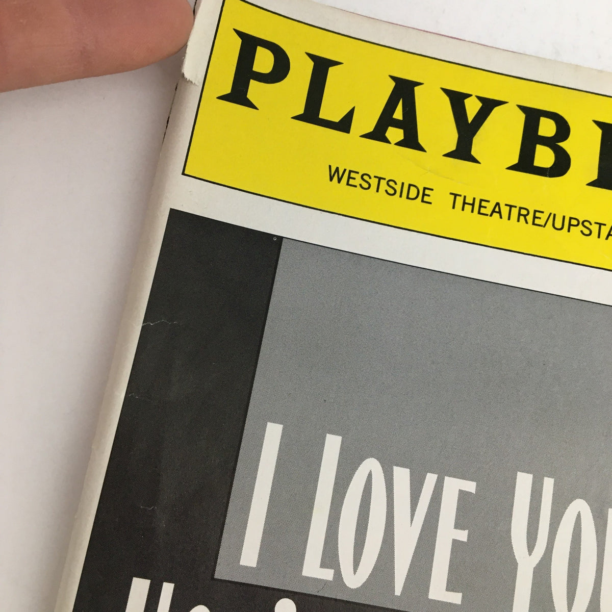 1996 Playbill for I Love You, You're Perfect, Now Change at the Westside Theater, featuring a recognizable bright yellow header and part of the cover design.