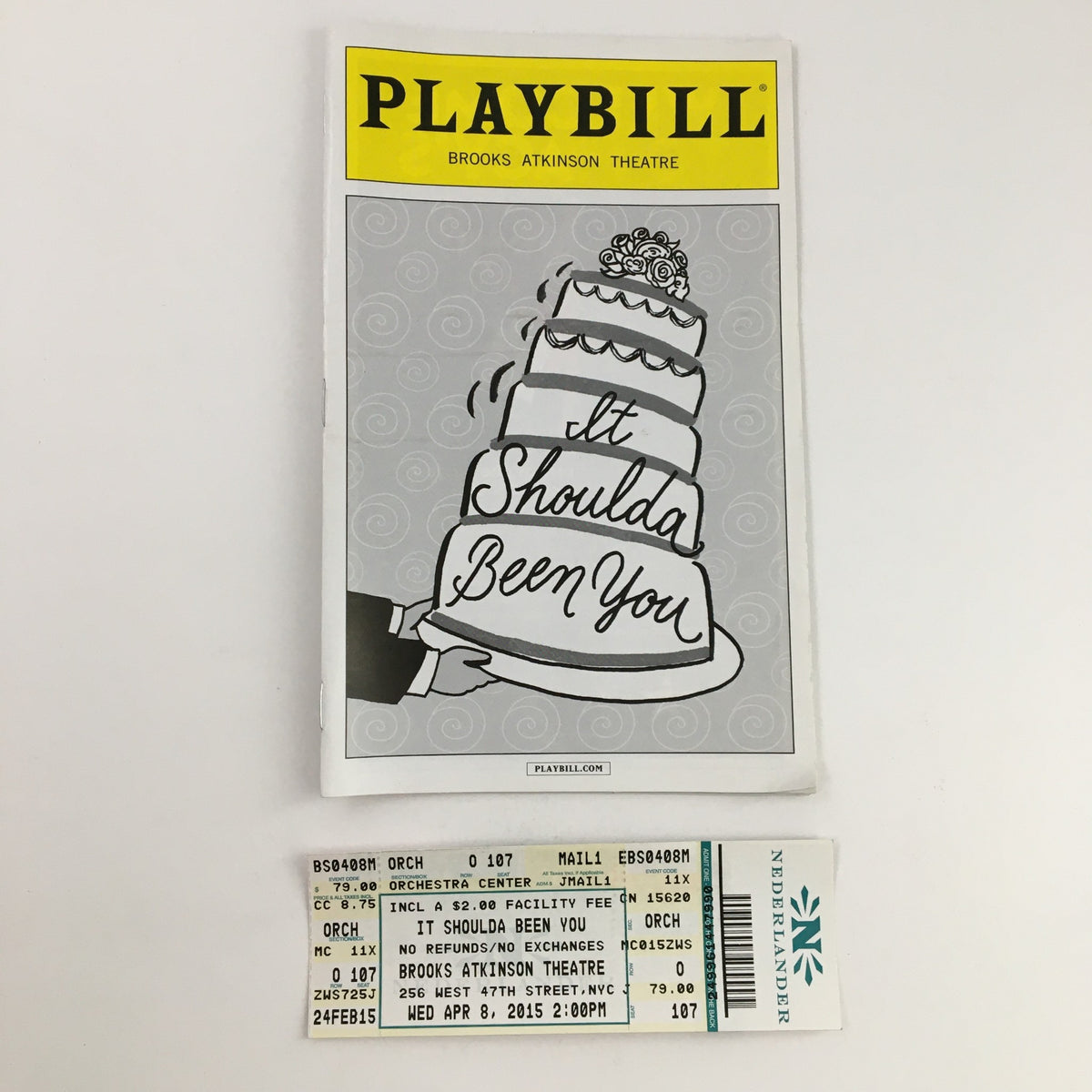 2015 Playbill for 'It Shoulda Been You' at Brooks Atkinson Theatre with ticket stubs, showcasing the cover design and theme of the show.