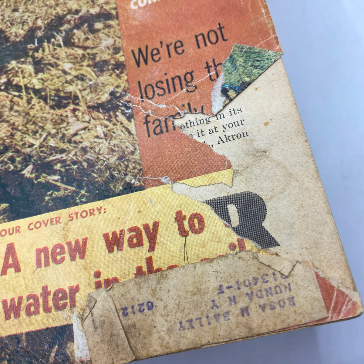 Close-up of the VTG Carper's Farmer Magazine October 1959 cover, highlighting worn edges and vintage advertisements, emphasizing its collectible nature.