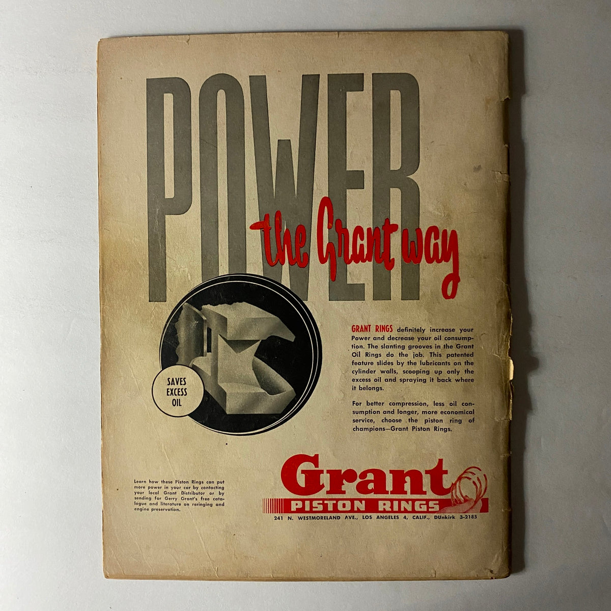Advertisement page showing Grant Piston Rings from VTG Hot Rod Magazine August 1952, emphasizing efficiency in engine performance.