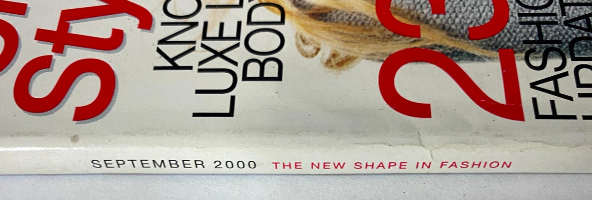 Close-up detail from Mode Magazine September 2001 showing 'September 2000 - The New Shape in Fashion' text, indicating a transitional issue highlighting fashion trends.