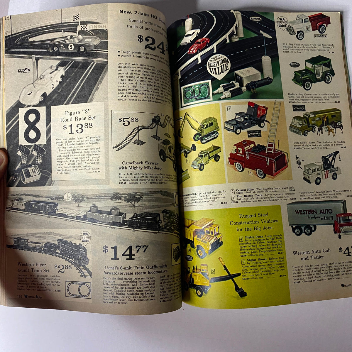 1967-1968 Western Auto The Family Store Fall & Winter Catalog page highlighting toy vehicles, race sets, and trucks, complete with product pricing.