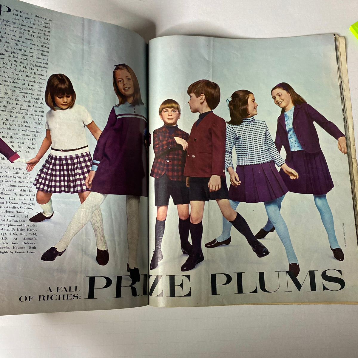 1966 Vogue Children Fall Catalog image showcasing children in stylish fall outfits, featuring plaid skirts, modern sweaters, and classic shoes, representing mid-century children's fashion trends.