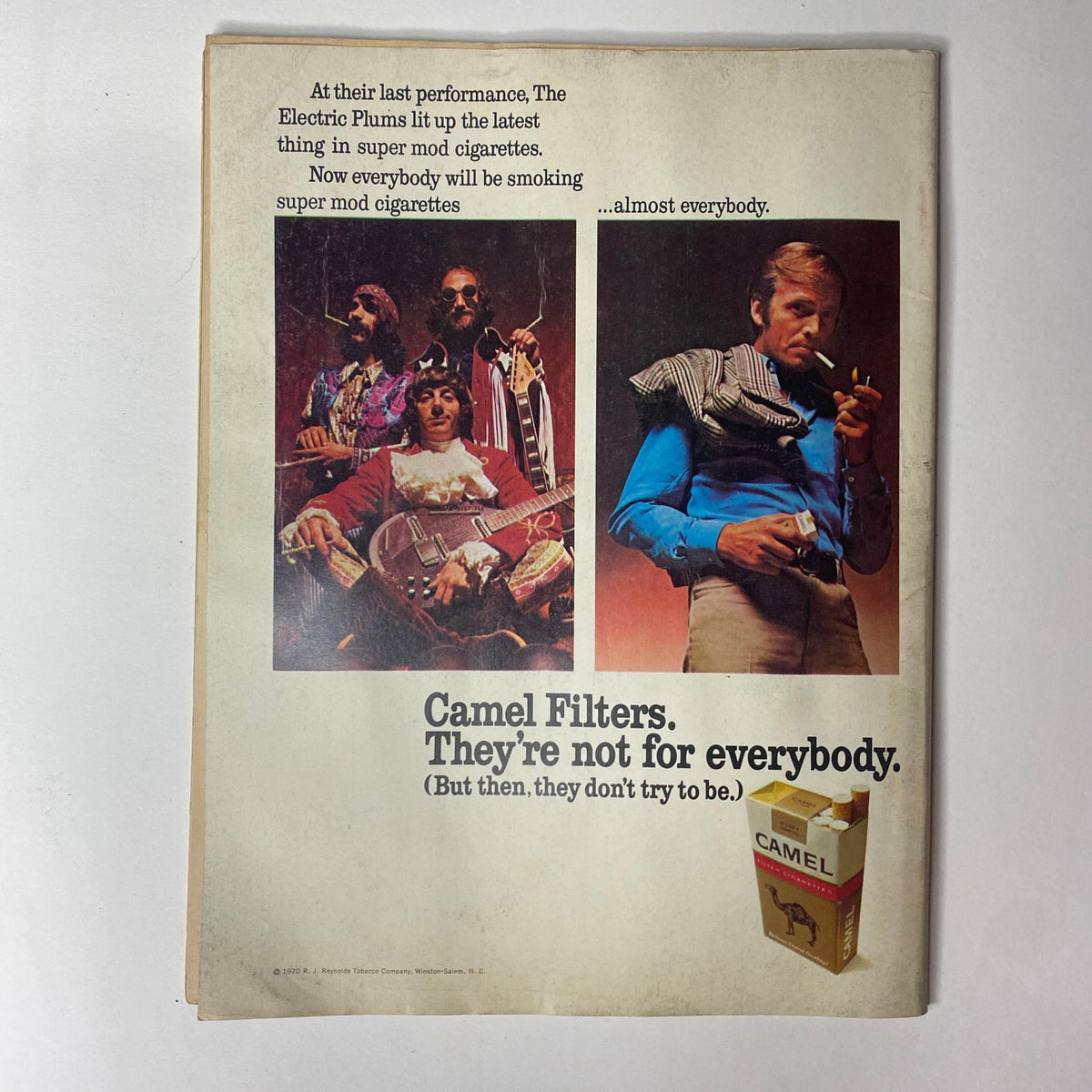 Advertisement from Car Craft Magazine October 1970 promoting Camel Filters cigarettes, featuring actors from a performance and emphasizing the unique appeal of the brand.