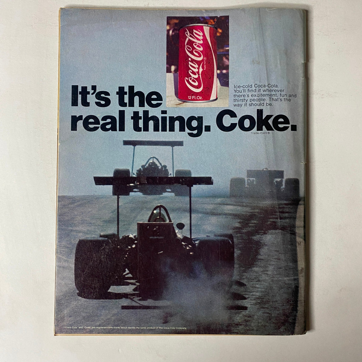 Advertising page for Coca-Cola featuring a race car, from Car Craft Magazine September 1971 Vol 19 No. 9. Highlighting the brand's association with motorsports.