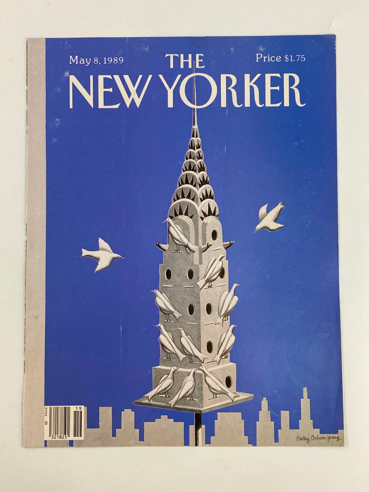 The New Yorker cover from May 8, 1989, featuring a birdhouse design by Kathy Osborn Young, showcasing a bright blue background and multiple birds.