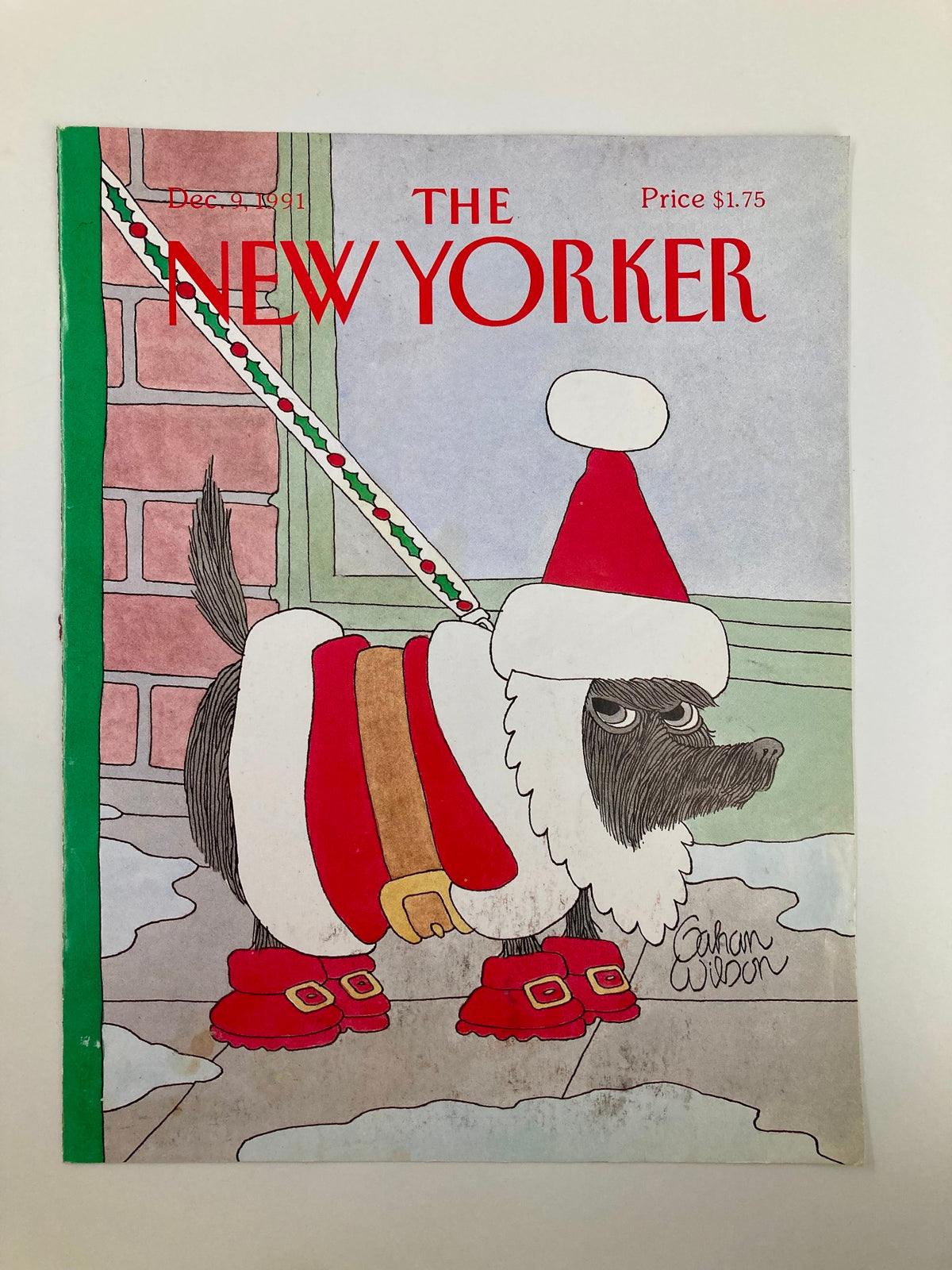 Cover of The New Yorker December 9, 1991, featuring a whimsical Christmas dog illustration by Gahan Wilson, showcasing a dog in a Santa costume with boots.
