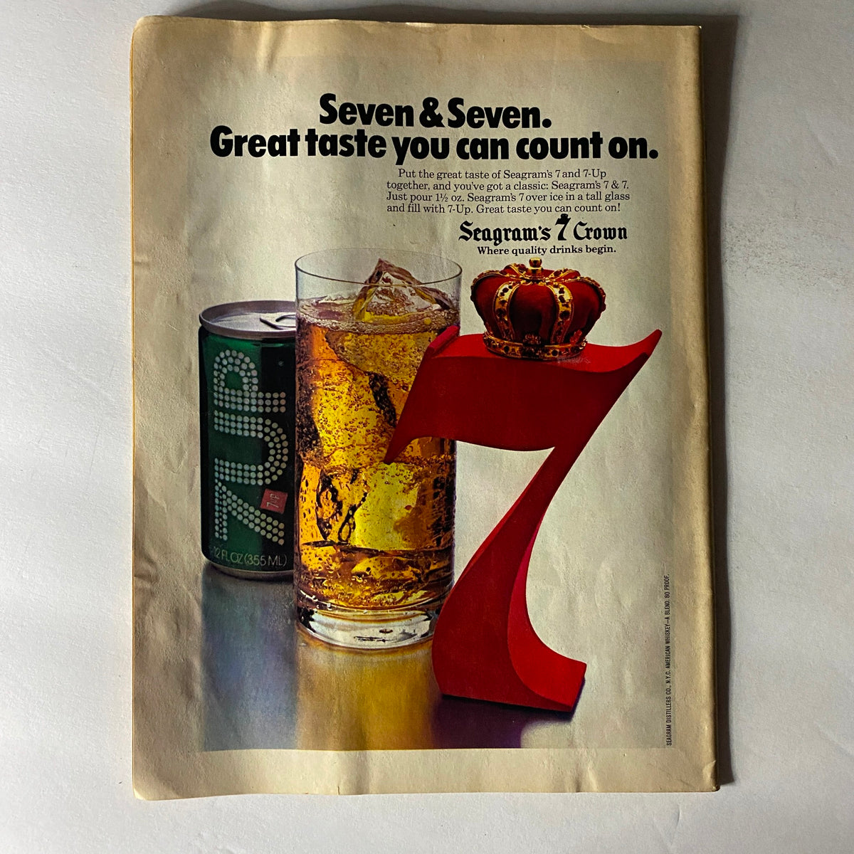 Vintage advertisement featuring Seagram's 7 and 7UP, showcasing the classic drink combination. The ad highlights the slogan 'Seven & Seven. Great taste you can count on.' Perfect for collectors of vintage promotional materials.