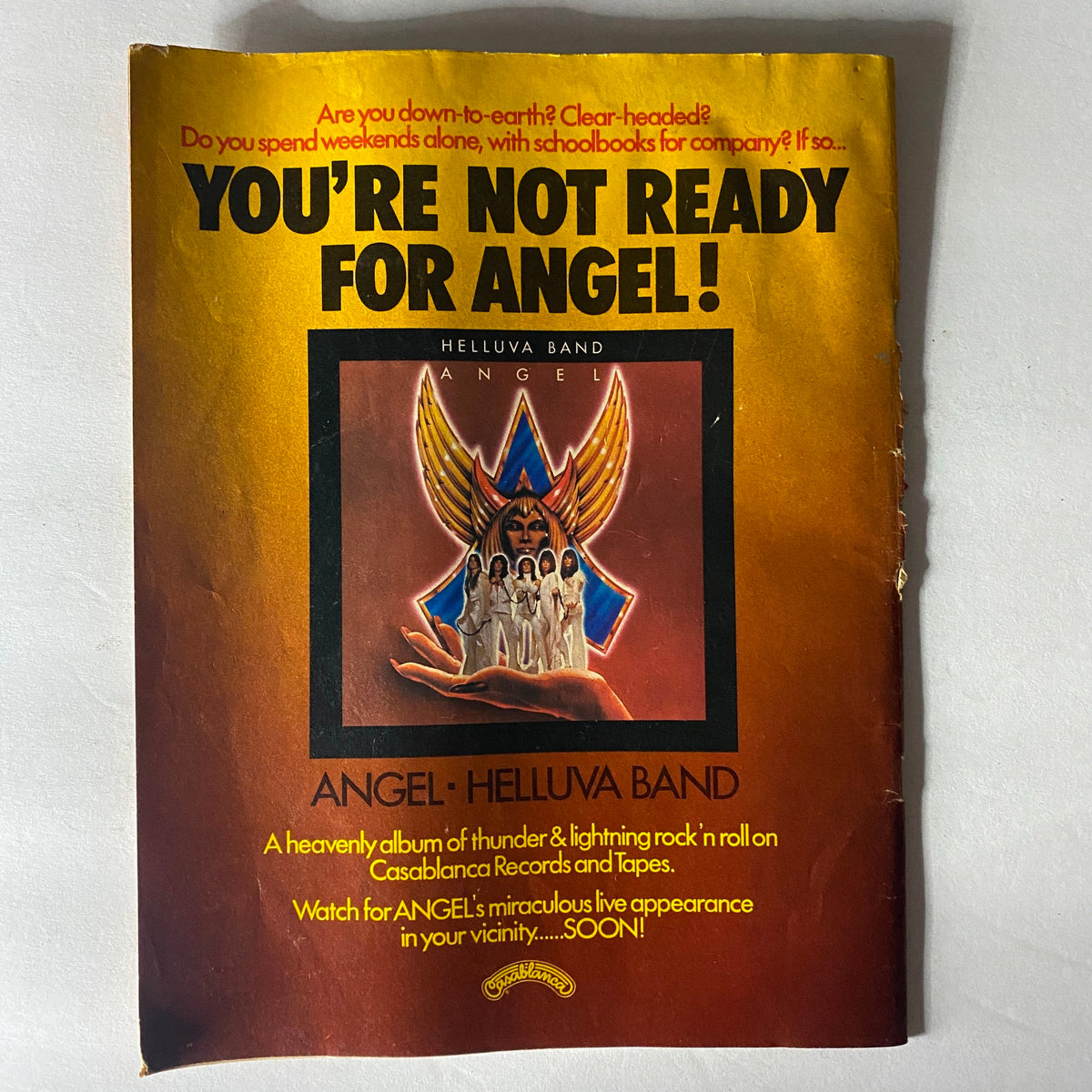 Back cover advertisement from VTG Circus Magazine July 22 1976 promoting Angel band, with vibrant colors and graphics, emphasizing live performances.