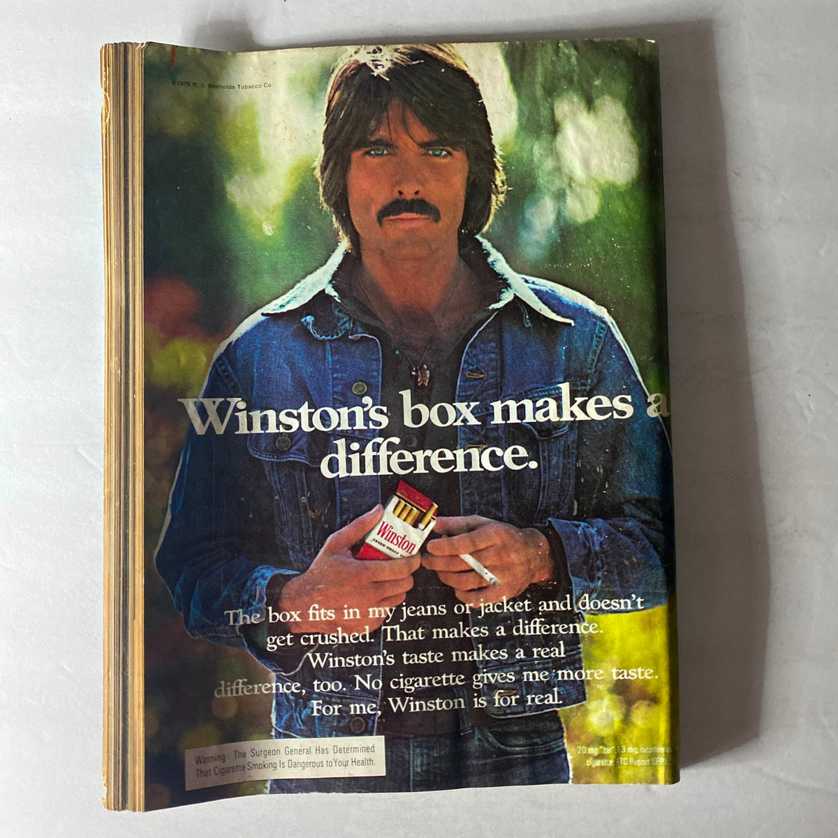 Cover of VTG Crawdaddy Magazine June 1976 with the tagline 'Winston's box makes a difference,' showcasing vintage advertising style and design.