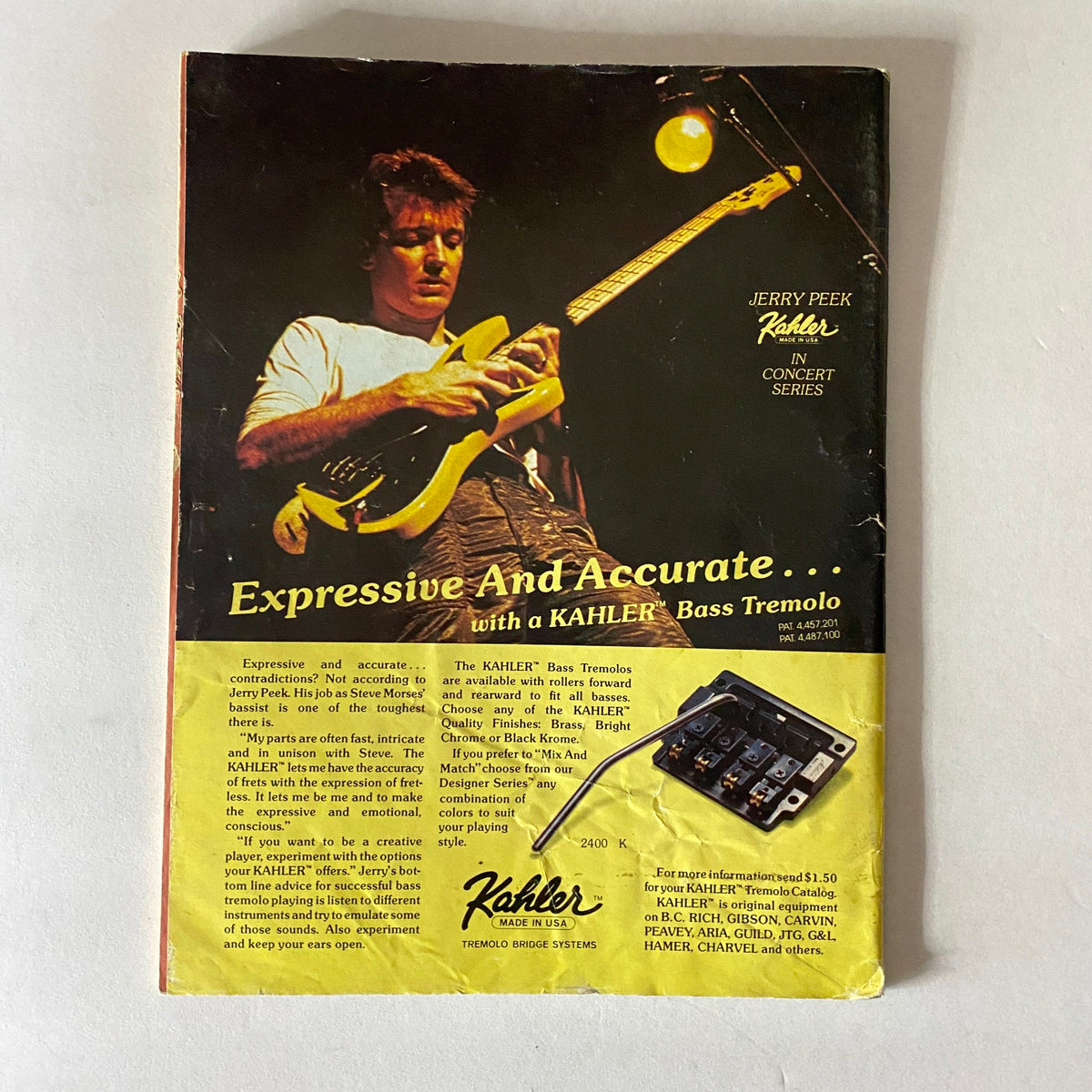 Back cover of VTG Guitar Magazine September 1985 featuring Jerry Peek demonstrating a Kahler Bass Tremolo and promotional content for guitar equipment.