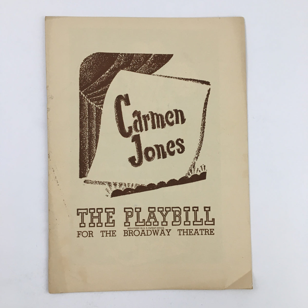 1945 Playbill cover for Carmen Jones, presented by The Broadway Theatre, featuring the title in vintage font on a textured background.