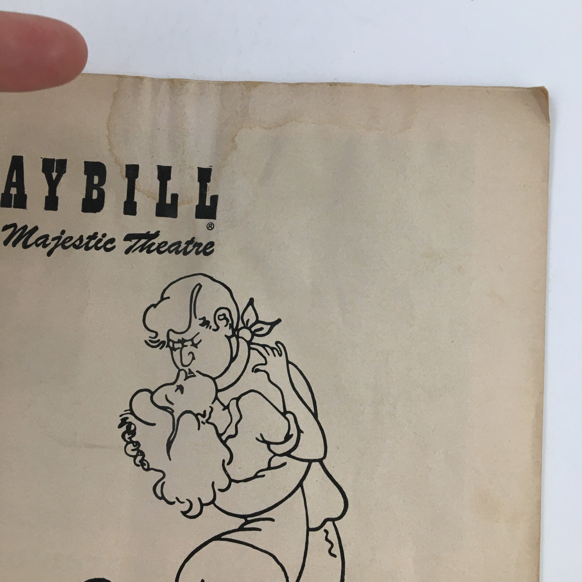 Detail view of the top portion of the 1955 Playbill for the Majestic Theatre's Fanny, showing the cover art and writing.
