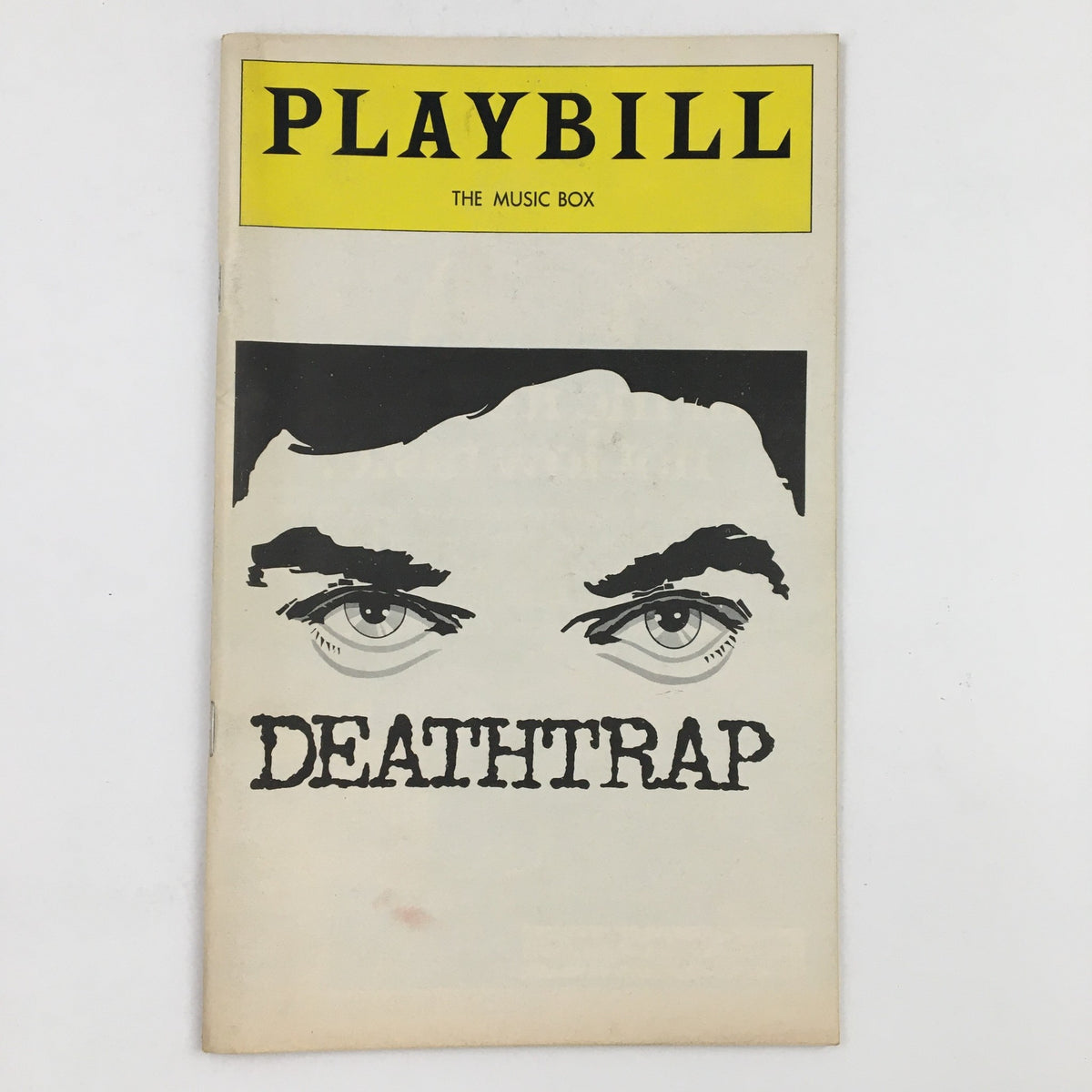 1978 Playbill The Music Box Present John Wood in Ira Levin's Deathtrap, featuring a striking cover design with dramatic eyes and the title 'DEATHTRAP' prominently displayed.